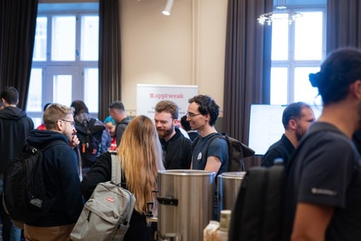 Attendees at the Shopify sponsor stand